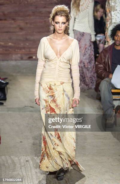 Diana Meszaros walks the runway during the Catherine Malandrino Ready to Wear Fall/Winter 2002-2003 fashion show as part of the New York Fashion Week...