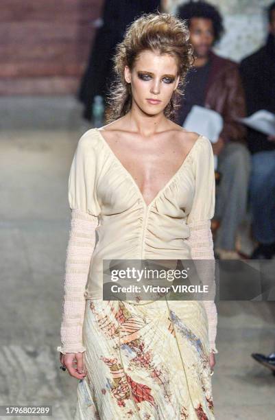 Diana Meszaros walks the runway during the Catherine Malandrino Ready to Wear Fall/Winter 2002-2003 fashion show as part of the New York Fashion Week...