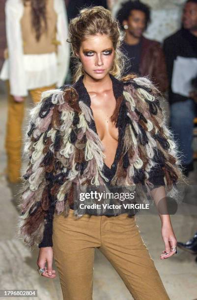 Ana Claudia Michels walks the runway during the Catherine Malandrino Ready to Wear Fall/Winter 2002-2003 fashion show as part of the New York Fashion...