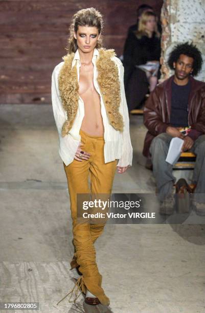 Michelle Alves walks the runway during the Catherine Malandrino Ready to Wear Fall/Winter 2002-2003 fashion show as part of the New York Fashion Week...