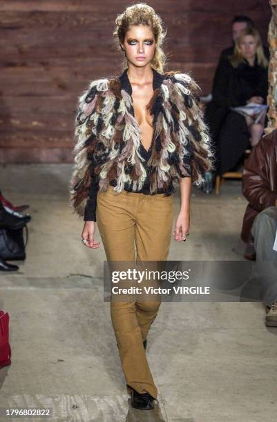 Ana Claudia Michels walks the runway during the Catherine Malandrino Ready to Wear Fall/Winter 2002-2003 fashion show as part of the New York Fashion...