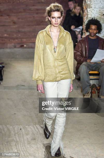 Model walks the runway during the Catherine Malandrino Ready to Wear Fall/Winter 2002-2003 fashion show as part of the New York Fashion Week on...