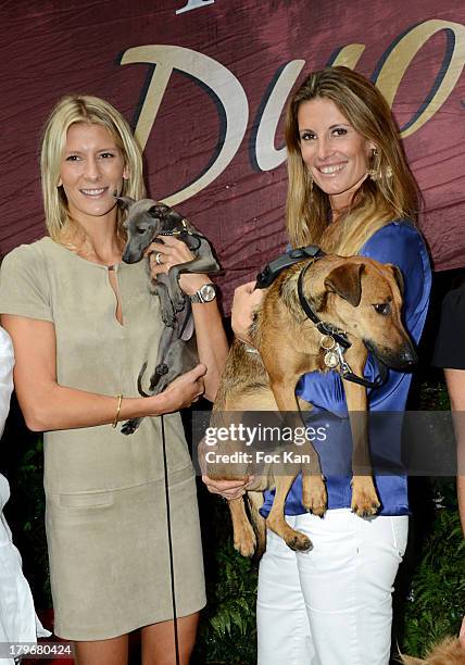 Presenter Helene Boucher and Miss France 1998 Sophie Thalmann attend the Duo Delice Dog Food Launch Party at 6 Mandel on September 6, 2013 in Paris,...