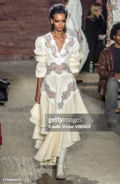 Liya Kebede walks the runway during the Catherine Malandrino Ready to Wear Fall/Winter 2002-2003 fashion show as part of the New York Fashion Week on...