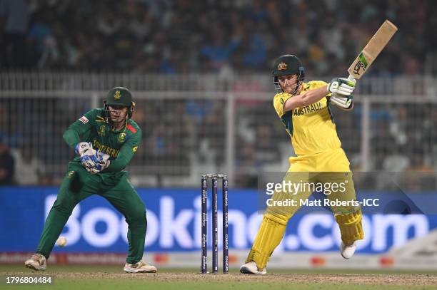 Josh Inglis of Australia bats as Quinton de Kock of South Africa keeps during the ICC Men's Cricket World Cup India 2023 Semi Final match between...