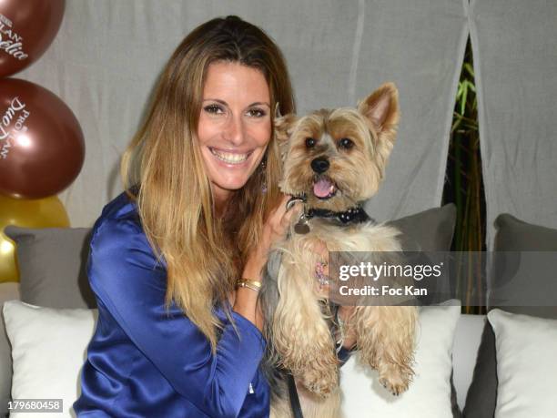 Former Miss France 1998/ TV presenter Sophie Thalmann and dog Voltaire attend the Duo Delice Dog Food Launch Party at 6 Mandel on September 6, 2013...