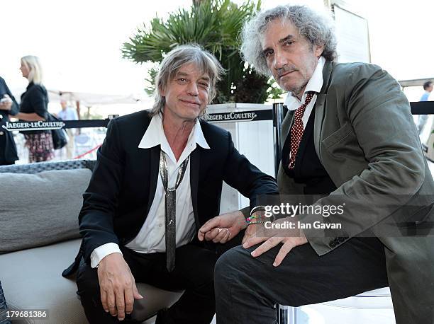 Jean-Louis Aubert and Philippe Garrel pose for a picture for Jaeger-LeCoultre at a reception prior to the 'Jealousy' premiere during the 70th Venice...