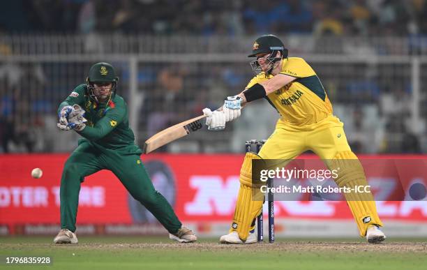 Steven Smith of Australia bats as Quinton de Kock of South Africa keeps during the ICC Men's Cricket World Cup India 2023 Semi Final match between...