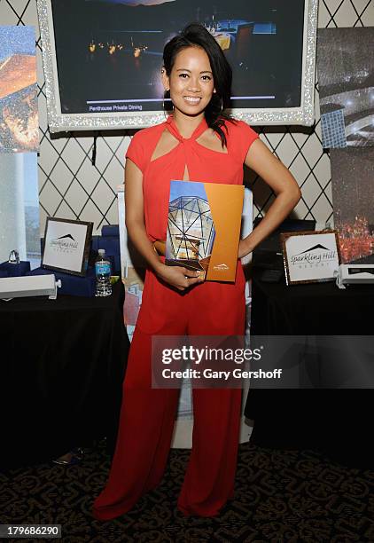 Designer Anya Ayoung-Chee poses at the GBK & Sparkling Resort Fashionable Lounge during Mercedes-Benz Fashion Week on September 6, 2013 in New York...