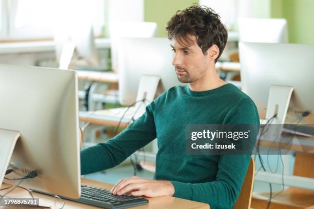 Computer Lab Photo Man 1,215 Computer Lab Office Stock Photos, High-Res Pictures, and Images ...