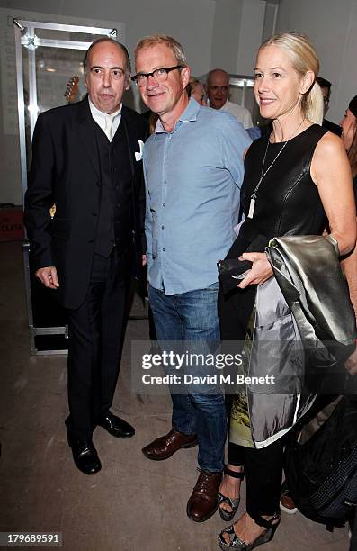 Mick Jones of The Clash, Harry Enfield and wife Lucy Lyster attend the launch of 'Black Market Clash', an exhibition of personal memorabilia and...