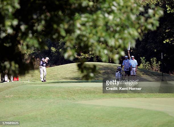 Edward Loar hits the ball off of the 9th tee during the second round of the Chiquita Classic in the Web.com tour finals at River Run Country Club on...