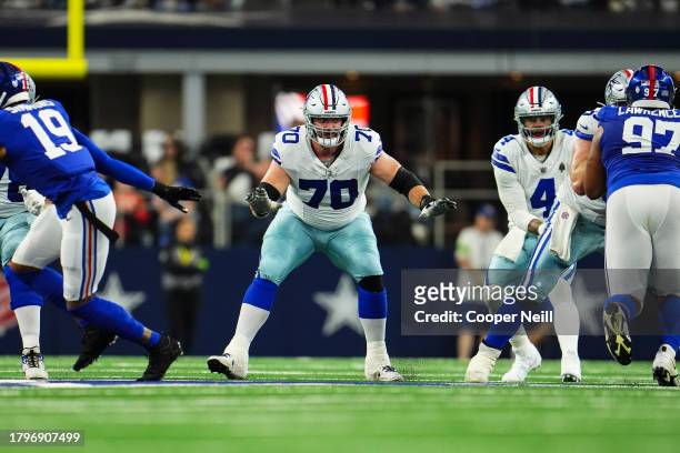 Zack Martin of the Dallas Cowboys steps up to block during an NFL football game against the New York Giants at AT&T Stadium on November 12, 2023 in...