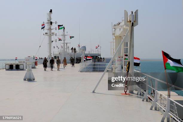 Picture taken during an organised tour by Yemen's Huthi rebels on November 22, 2023 shows the Galaxy Leader cargo ship, seized by Huthi fighters two...