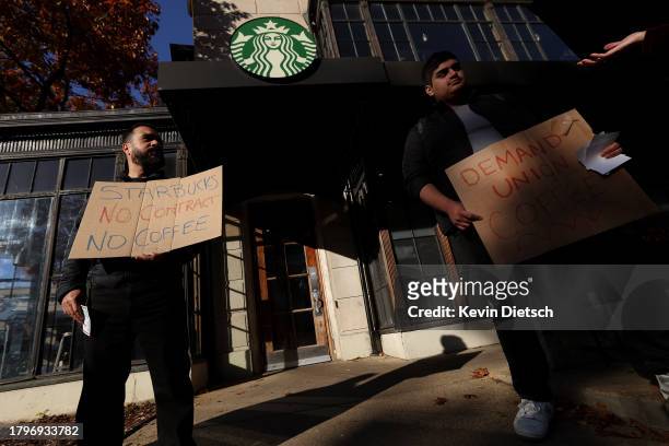 Members and supporters of Starbucks Workers United protest outside of a Starbucks store in Dupont Circle on November 16, 2023 in Washington, DC. The...