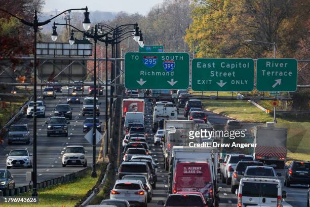 Heavy traffic moves along Interstate 295 on Wednesday morning November 22, 2023 in Washington, DC. This Thanksgiving season, the American Automobile...