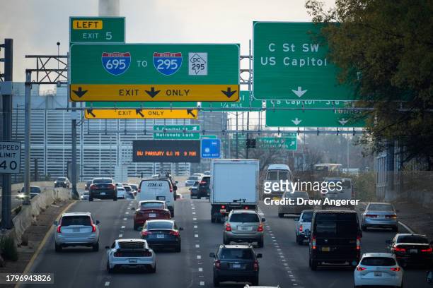 Traffic moves along Interstate 695 on Wednesday morning November 22, 2023 in Washington, DC. This Thanksgiving season, the American Automobile...