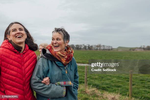 improving their mental wellbeing - puffer jacket stock pictures, royalty-free photos & images