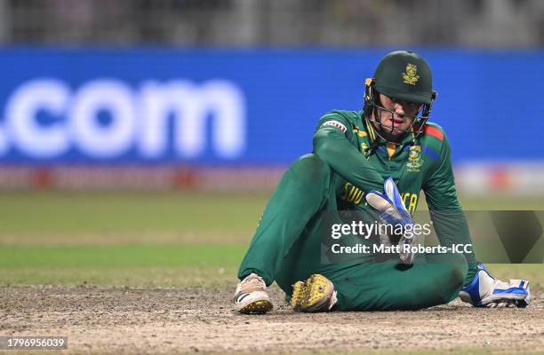 Quinton de Kock of South Africa looks dejected following defeat in the ICC Men's Cricket World Cup India 2023 Semi Final match between South Africa...