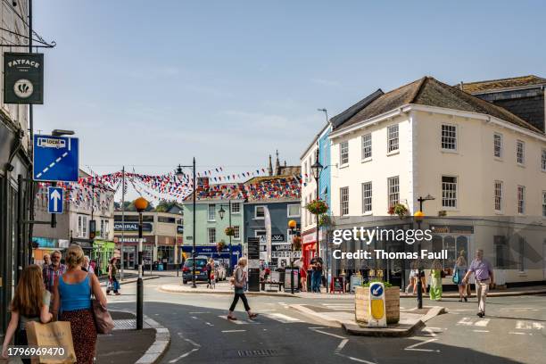 shops and shoppers in truro city centre - truro cornwall stock pictures, royalty-free photos & images