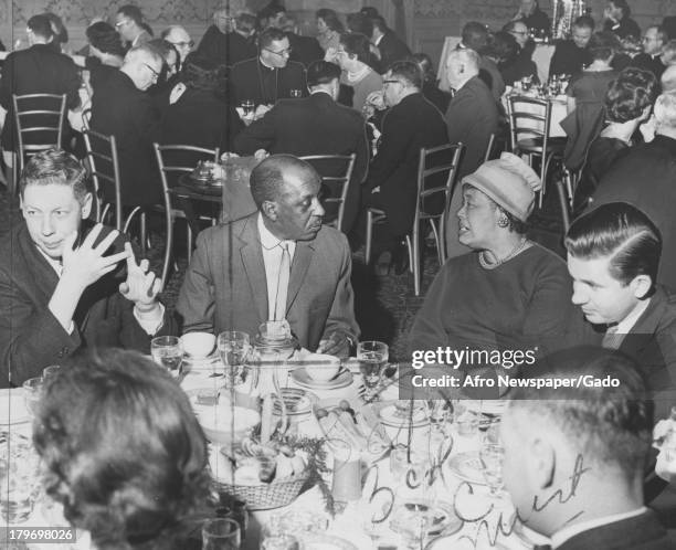 The 50th anniversary of the Baltimore Catholic Review was observed at a dinner meeting at the Sheraton, Baltimore, Maryland, December 14, 1963....