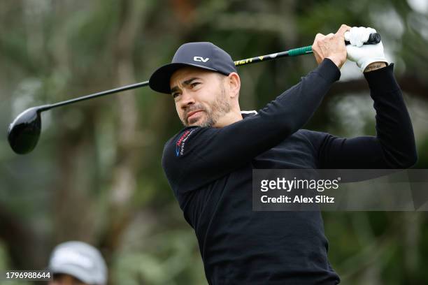 Camilo Villegas of Colombia hits a tee shot on the second hole during the first round of The RSM Classic on the Seaside Course at Sea Island Resort...