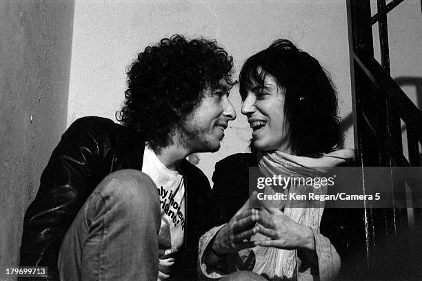 Musician Bob Dylan and Patti Smith are photographed at a party during the Rolling Thunder Revue tour in October 1975 in New York City. CREDIT MUST...