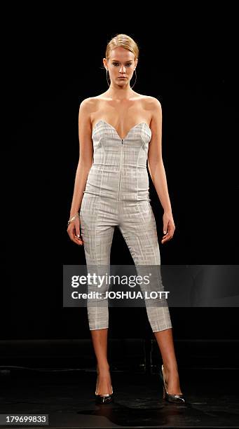 Model presents a creation by Blaise Kavanagh during the Fashion Law Institute fashion show at the Mercedes-Benz Fashion Week Spring 2014 collections...