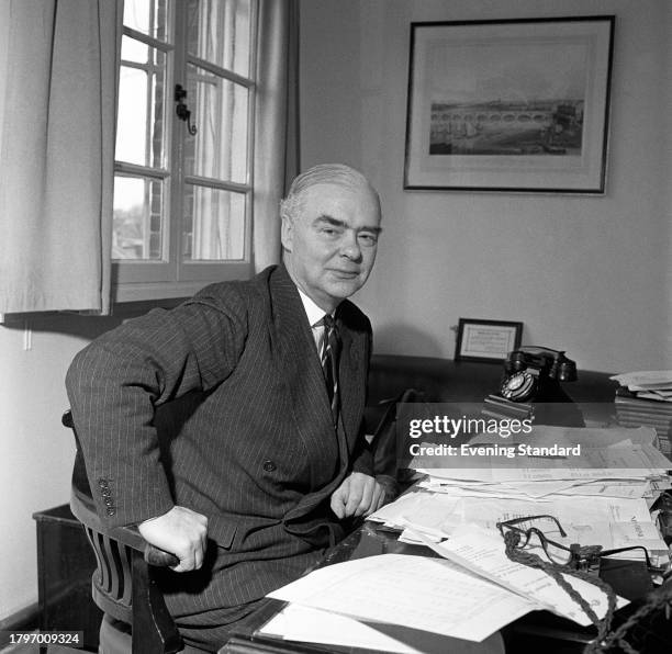 Businessman and head of Decca records Edward Lewis at his desk, May 17th 1957.