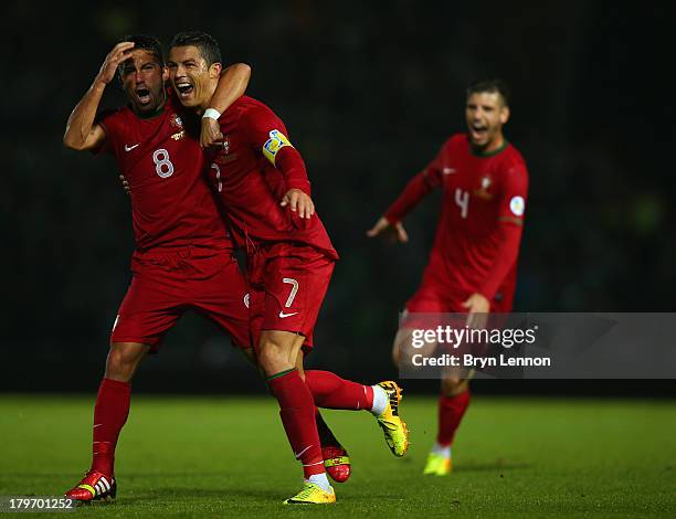 Cristiano Ronaldo of Portugal celebrates scoring during the FIFA 2014 World Cup Qualifying Group F match between Northern Ireland and Portugal at...