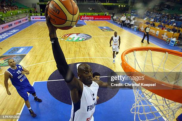 Johan Petro of France dunks the ball during the FIBA European Championships 2013 first round group A match between France and Israel at Tivoli Arena...