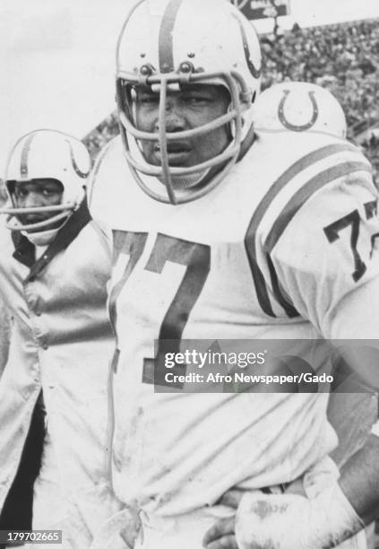 Jim Parker, #77, was a first round draft pick in 1957, and played as an offensive lineman for the Baltimore Colts until his last game, 1967.