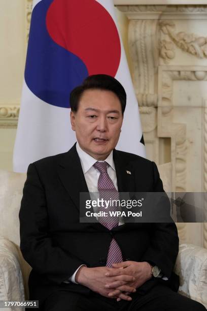 President of South Korea Yoon Suk Yeol makes some remarks to the media at the start of his meeting with Britain's Prime Minister Rishi Sunak inside...