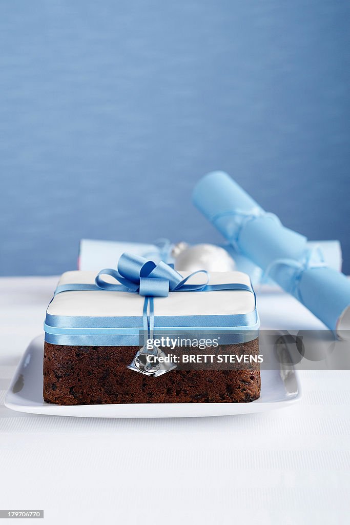 Square boiled fruitcake with blue bow