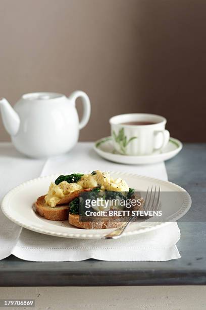 scrambled eggs on crusty bread - pancetta stock pictures, royalty-free photos & images