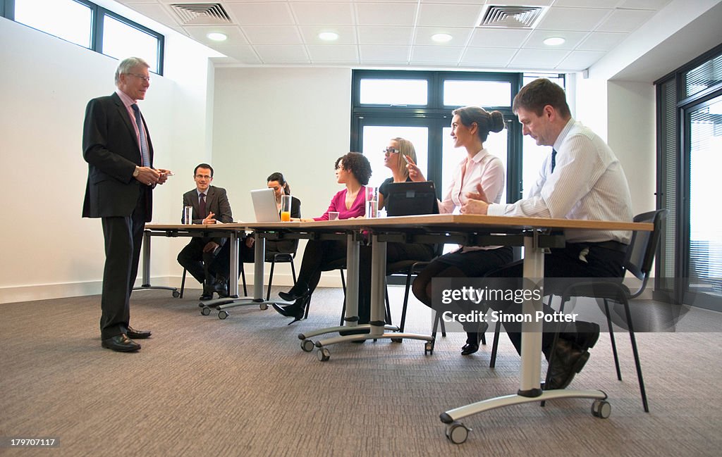 Office colleagues meeting in conference room