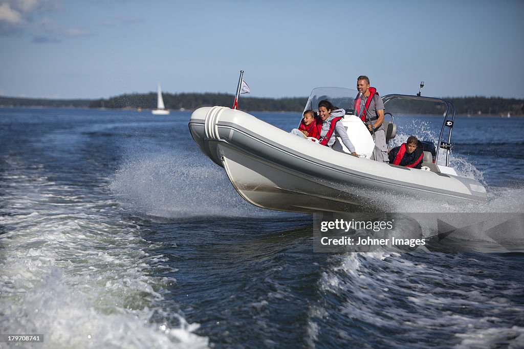 Family in motorboat