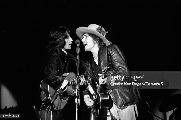 Musicians Bob Dylan and Joan Baez are photographed during the Rolling Thunder Revue in 1975. CREDIT MUST READ: Ken Regan/Camera 5 via Contour by...