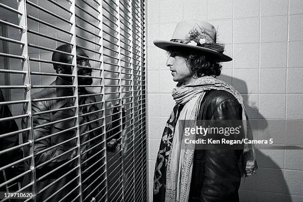 Musician Bob Dylan is photographed visiting Rubin 'Hurricane' Carter at New Jersey's Clinton State Prison during the Rolling Thunder Revue on...