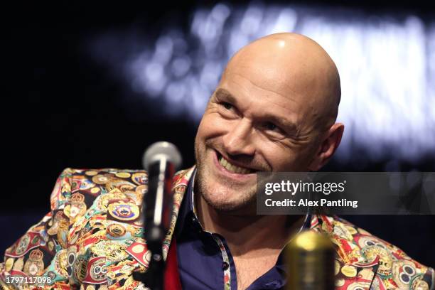 Tyson Fury reacts during the Tyson Fury v Oleksandr Usyk Press Conference at Outernet London on November 16, 2023 in London, England.