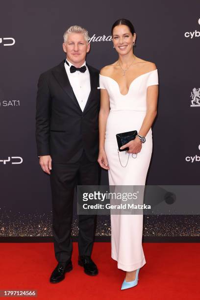 Bastian Schweinsteiger and Ana Schweinsteiger arrive for the 75th Bambi Awards at Bavaria Filmstadt on November 16, 2023 in Munich, Germany.
