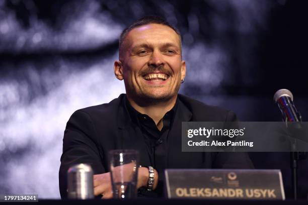 Oleksandr Usyk reacts during the Tyson Fury v Oleksandr Usyk Press Conference at Outernet London on November 16, 2023 in London, England.