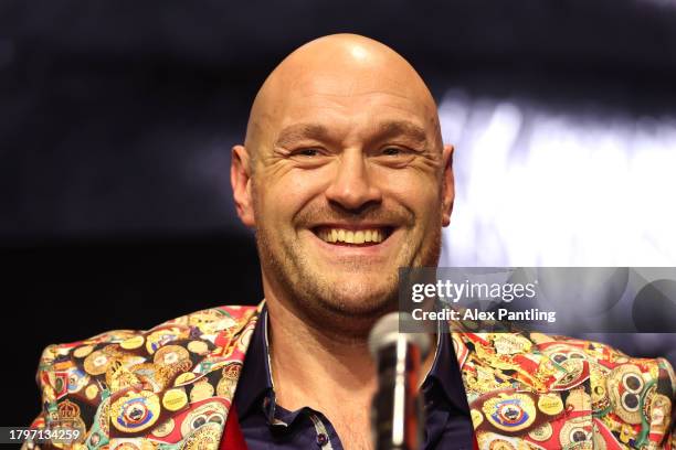 Tyson Fury reacts during the Tyson Fury v Oleksandr Usyk Press Conference at Outernet London on November 16, 2023 in London, England.