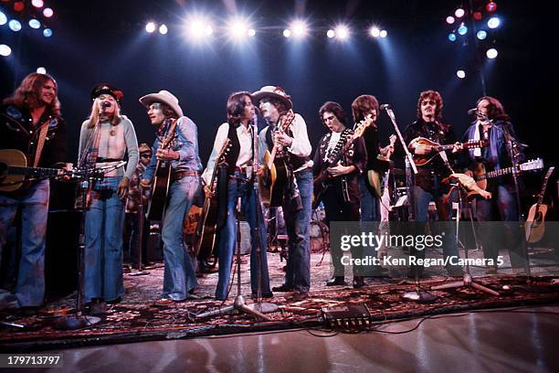 Musicians Bob Dylan, Joan Baez and The Band of Merry Players are photographed onstage during the Rolling Thunder Revue in 1975. CREDIT MUST READ: Ken...