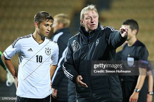 Head coach Horst Hrubesch issues instructions to Moritz Leitner of Germany during the UEFA Under21 Euro 2015 Qualifier match between Faroe Islands...