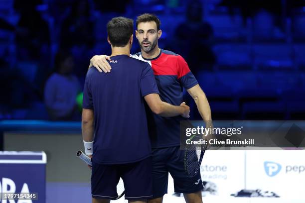 Marcel Granollers of Spain and Horacio Zeballos of Argentina celebrate victory against Maximo Gonzalez and Andres Molteni of Argentina in the Men's...