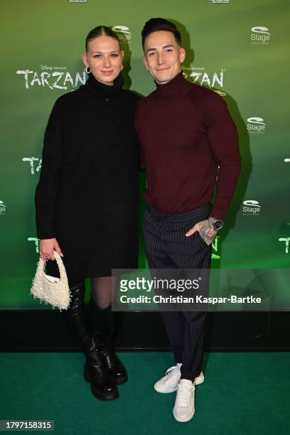 Gymnast Marcel Nguyen attends with his girlfriend Noemi Peschel the musical premiere of "Tarzan" at Stage Palladium Theater on November 16, 2023 in...