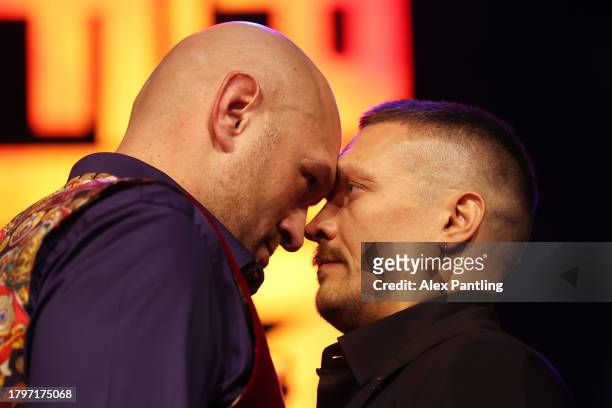 Tyson Fury and Oleksandr Usyk face off during the Tyson Fury v Oleksandr Usyk Press Conference at Outernet London on November 16, 2023 in London,...