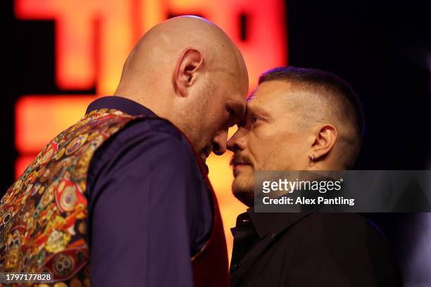 Tyson Fury and Oleksandr Usyk face off during the Tyson Fury v Oleksandr Usyk Press Conference at Outernet London on November 16, 2023 in London,...