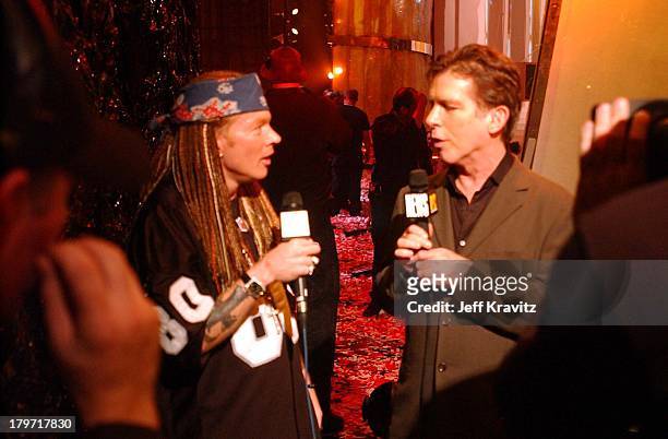 Axl Rose & Kurt Loder during 2002 MTV Video Music Awards - Audience & Backstage at Radio City Music Hall in New York City, New York, United States.
